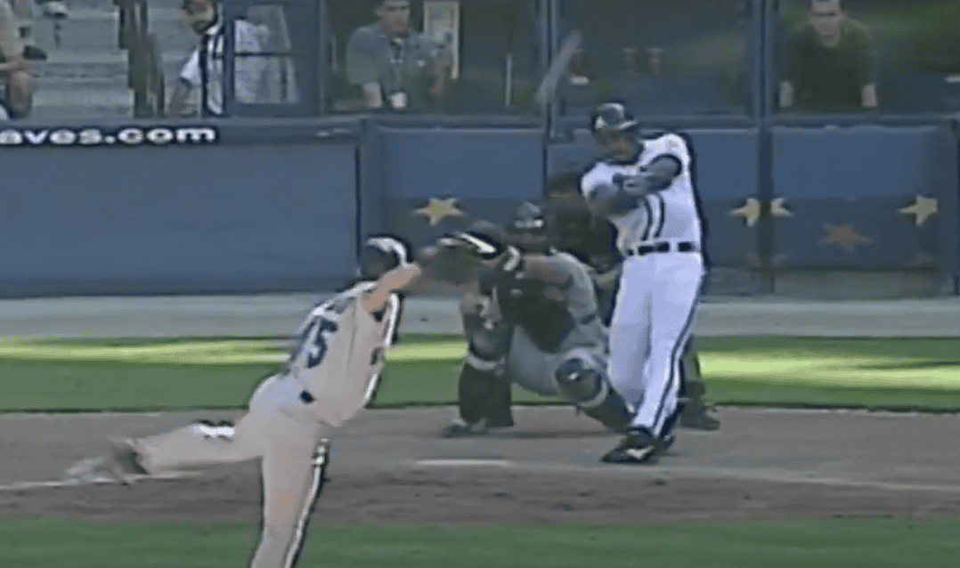 Brian Jordan in action, showcasing his dual talent as an MLB star and Pro Bowl safety.